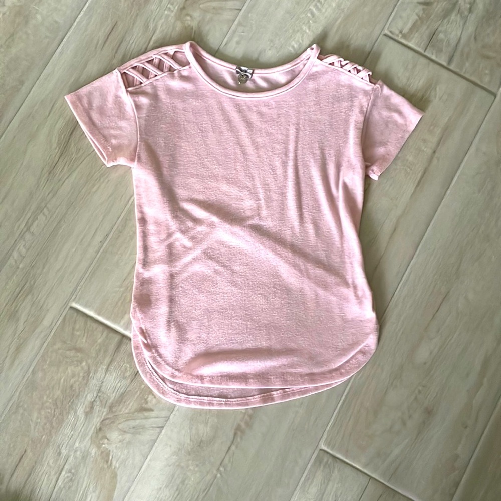 Pink shirt with shoulder design